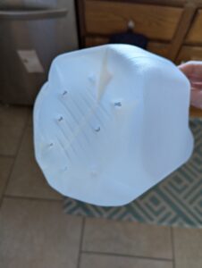 Milk jug drainage holes