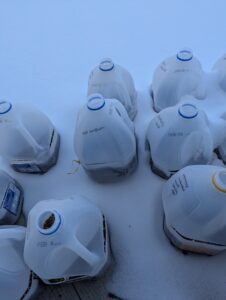 Newly completed jug outside with others